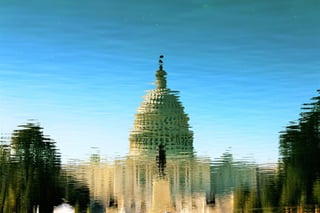 Capitol Building Reflected In Water